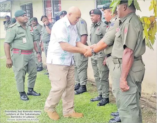  ?? Picture: SERAFINA SILAITOGA ?? President Jioji Konrote meets soldiers at the Sukanaival­u Barracks in Labasa.