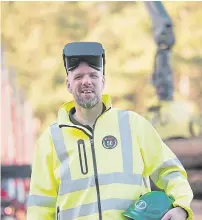  ??  ?? Clockwise from top: Gary Woodhouse of James Jones &amp; Sons demonstrat­es the virtual reality headset; External technology replaces the crane cab; One of the new Volvo FH 500 HiVision loglift lorries; Driver and operator Gary Woodhouse.