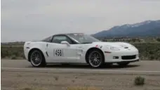  ??  ?? A Corvette races through the one-mile shootout near Ely.