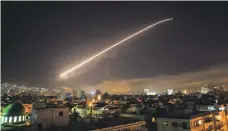  ?? AP ?? The US launches an attack on Syria yesterday