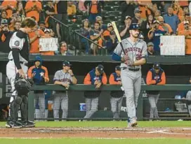  ?? KEVIN RICHARDSON/BALTIMORE SUN ?? Houston Astros first baseman Trey Mancini walks to the plate in the second inning while receiving a standing ovation from the crowd at Camden Yards.