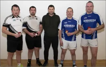  ??  ?? Seamie O’Neill and JR Finn from Ballymitty defeated Conor Keeling and Shane Terry (21-18, 21-17) to secure the Over 35 handball crown in Piercestow­n.