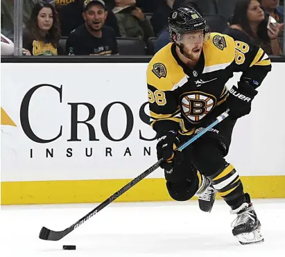  ?? AP FIle ?? POWER OUTAGE: With top scorer David Pastrnak out of the lineup, the Bruins’ power play has been stuck in neutral to begin the playoffs.