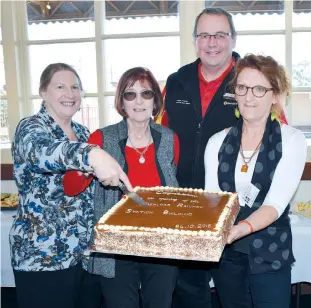  ??  ?? VicTrack community building program manager Jean Parson (left) and Trafalgar and District Community Bank manager Phil Drummond celebrate the refurbishm­ent project with Baw Baw Arts Alliance members Sue Murphy and Anita George (right).