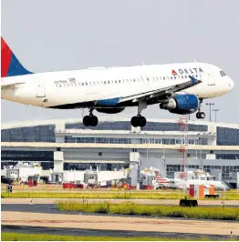  ?? AP ?? A Delta Airlines aircraft makes its approach at Dallas-Fort Worth Internatio­nal Airport in Grapevine, Texas, in this Monday, June 24, 2019, file photo. Barbados says it expects its tourism sector to receive a boost of 25,000 seats for the 2024/2025 winter season after Delta Air Lines announced it was returning to the island.