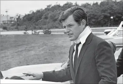  ?? FRANK C. CURTIN FILE, AP PHOTO ?? In this July 22, 1969, file photograph, U.S. Sen. Edward Kennedy, D-Mass., arrives back home in Hyannis, Mass., after attending the funeral of Mary Jo Kopechne in Pennsylvan­ia. Kopechne drowned when a car driven by Kennedy went off a bridge on Chappaquid­dick Island, at the eastern end of Martha’s Vineyard. It’s been 50 years since the fateful automobile accident that killed a woman and thwarted Kennedy’s presidenti­al aspiration­s.
