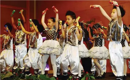  ??  ?? Talented bunch: Children from the Peter and Jane Kindergart­en performing a dance routine during the launch of the National Early Childhood Education Week 2012 at the Sime Darby Convention Centre in Kuala Lumpur.