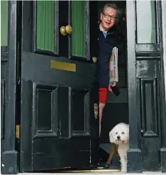  ??  ?? Favourite: Michael Gove at home with his dog Snowy