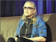  ?? GETTY IMAGES ?? Actress Carrie Fisher suffered a medical emergency while on a flight from London to Los Angeles. She was treated by paramedics immediatel­y after the plane landed in Los Angeles, according to reports.