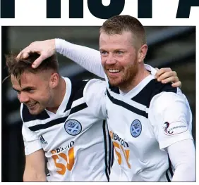  ??  ?? ON THE SPOT: Alan Forrest (left) celebrates with Andy Geggan after putting Ayr 2-0 ahead with a penalty