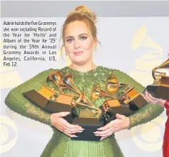  ??  ?? Adele holds the five Grammys she won including Record of the Year for ‘Hello’ and Album of the Year for ‘25’ during the 59th Annual Grammy Awards in Los Angeles, California, US, Feb 12.