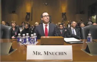  ?? J. Scott Applewhite / Associated Press ?? Former Goldman Sachs banker Steven Mnuchin struggled to answer questions about his use of tax havens as a hedge fund manager and whether he thought such loopholes should be closed.