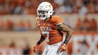  ?? Chuck Burton / Associated Press ?? Former Longhorns player Caden Sterns tweeted, “My teammates and I got threatened by some alumni that we would have to find jobs outside of Texas if we didn’t (sing) ‘The Eyes of Texas.’ ”