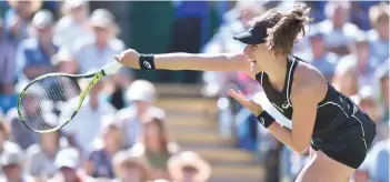  ?? — AFP ?? Britain’s Johanna Konta serves to Serbia’s Aleksandra Krunic in Eastbourne, southern England.