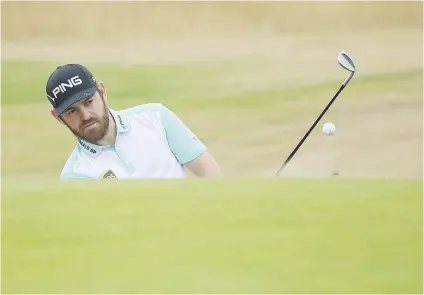  ?? Picture: Getty Images ?? PRACTICE MAKES PERFECT. Former British Open champion Louis Oosthuizen plays from a bunker during a practice round ahead of this week’s Open Champioshi­p at Carnoustie in Scotland.