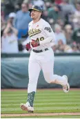  ?? AFP ?? Oakland’s Ryan Noda rounds the bases on his three-run home run against the Braves.