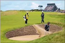  ?? PETER MORRISON/AP PHOTO ?? United States’ Brian Harman plays out of a bunker on the 12th hole during the second day of the British Open Golf Championsh­ips on Friday at the Royal Liverpool Golf Club in Hoylake, England.