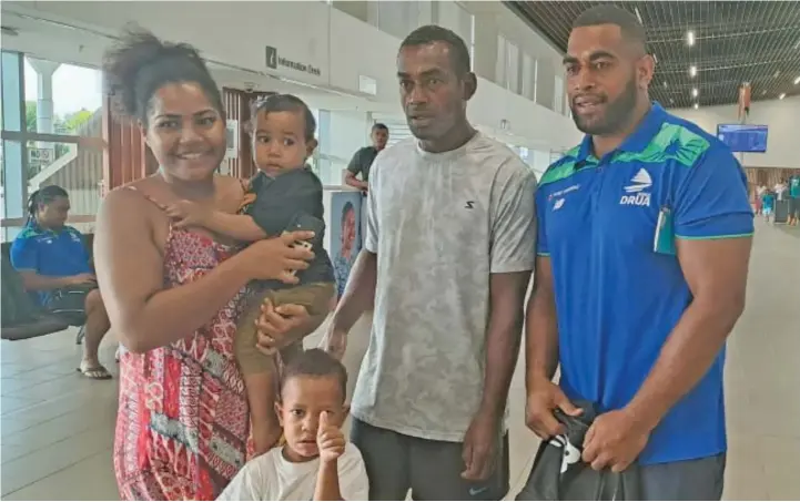  ?? Photo: Waisea Nasokia ?? From left: Miriama Natave, carries baby daughter Arieta, son Bakewa, Sekove Natave with Swire Shipping Fijian Drua prop Livai Natave at Nadi Internatio­nal Airport on March 2, 2023.