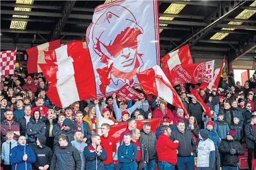  ??  ?? The rules for the test ‘crowd’ at today’s match at Pittodrie have Cava Kenny nervous. No singing ‘Stand Free’, no mutual exchanging of eye-rolls with your neighbouri­ng fan when the game takes a frustratin­g turn – and don’t even think about touching a ball coming right at you