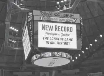  ?? JEFF SINER / CHARLOTTE OBSERVER VIA THE ASSOCIATED PRESS ?? Charlotte’s Bojangles Coliseum was home to the longest game in AHL history early Thursday morning, as the Lehigh Valley Phantoms beat the Charlotte Checkers 2-1 in a fifth overtime to take a 3-1 series lead.