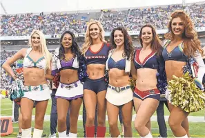  ??  ?? Cheerleade­rs aren’t a part of football for their athleticis­m or dancing ability. Their main purpose is to titillate. KIRBY LEE/USA TODAY SPORTS