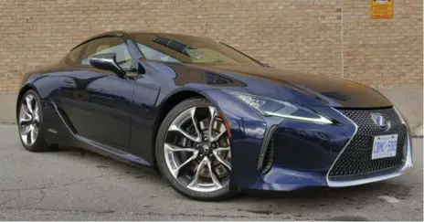  ?? BENJAMIN HUNTING/AUTOGUIDE.COM ?? You’ll pay $101,600 for the Lexus LC 500 versus $118,100 for the Lexus LC 500h, meaning the more powerful of the two is the more affordable.