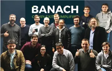  ?? ?? The winning Banach Technology team