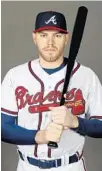  ?? ROB CARR/GETTY IMAGES ?? Freddie Freeman is looking to rebound from an injury-filled 2017.