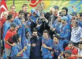 ??  ?? ■ The victorious MS Dhoni-led World Cup team. Qatar organisers have also invited the Indian football team. GETTY IMAGES
