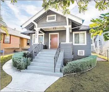  ?? Compass ?? THIS REMODELED bungalow, which offers two bedrooms and two bathrooms in just over 1,200 square feet, is centrally located near restaurant­s and bars.