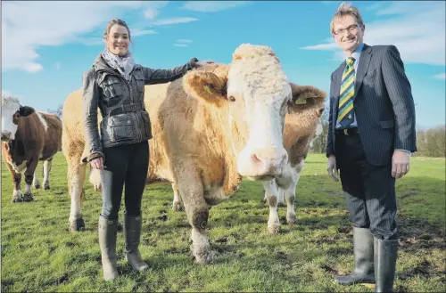  ?? PICTURE: SIMON DEWHURST. ?? BEEFING UP: Sarah Pick, 29 of Barnsley, with Nigel Pulling, chief executive of the Yorkshire Agricultur­al Society.
