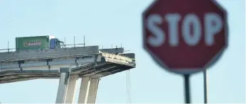  ?? | LUCA ZENNARO ANSA VIA AP ?? A TRUCK stuck on a remnant of the Morandi highway bridge in Genoa, Italy, which collapsed in August last year. A reader suggests South Africans should devote 2019 to rebuilding bridges.