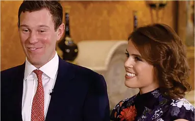  ??  ?? Beaming with happiness: Eugenie with Jack Brooksbank on The One Show last night