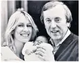  ??  ?? …And welcome: Sir David Frost with his wife Carina and their eldest son, Miles