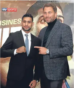  ?? Picture: PA. ?? Amir Khan and Eddie Hearn. The welterweig­ht signed a three-fight contract with the promoter and will return to the ring after a near two-year absence at Liverpool’s Echo Arena in April.