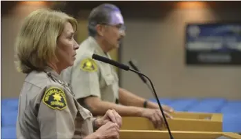  ?? EDWIN DELGADO PHOTO ?? Sheriff’s Office Chief Deputy of Correction­s Jamie Clayton (alongside County Sheriff Raymond Loera) speaks to the board about the revised staffing plan for the new Jail.