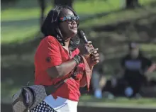  ?? ERIC ALBRECHT/COLUMBUS DISPATCH ?? Tammy Fournier-alsaada speaks at an event on June 6, 2020, at Franklin Park to mark the 4-year anniversar­y of Henry Green’s death in a shootout with two plaincloth­es Columbus police officers in North Linden.