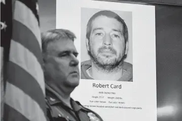  ?? DAVID SOKOL USA TODAY NETWORK ?? A photo of the alleged shooter is shown on a screen during a press conference at the Lewiston (Maine) City Hall on Friday. Robert Card’s body was found later in a recycling center trailer, dead from a self-inflicted gunshot wound.