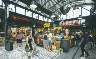  ?? (Marc Israel Sellem/The Jerusalem Post) ?? PEOPLE WALK through Sarona Market in Tel Aviv, which is open on Shabbat.