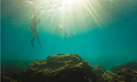  ?? ARIEL SCHALIT/AP ?? Snorkelers explore the Mediterran­ean Sea marine reserve of Gador on Oct. 29 near Hadera in northern Israel.