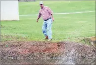  ?? FILE PHOTO ?? John Baker skips a rock across the pond at MacArthur Park in downtown Little Rock. He created a nonprofit organizati­on, the Great Southern Stone-Skipping Championsh­ips Inc. The second-annual event will be Saturday in a cove near the Fairfield Bay...