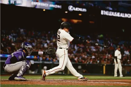  ?? Jed Jacobsohn / Getty Images ?? Starting pitcher Logan Webb did well at the plate, settling for a two-run single after barely missing a grand slam.