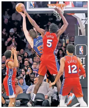  ?? ?? STUFFED: Isaiah Hartenstei­n is blocked at the rim by the 76ers’ Mo Bamba in a demoralizi­ng and dishearten­ing 79-73 loss on Sunday. It’s the kind of loss that can be a catalyst for change or break the Knicks, writes The Post’s Mike Vaccaro.