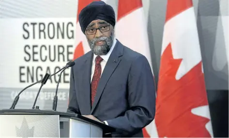  ?? ADRIAN WYLD/THE CANADIAN PRESS ?? Defence Minister Harjit Sajjan unveils the Liberal government’s long-awaited vision for expanding the Canadian Armed Forces in Ottawa on Wednesday. Canada will increase defence spending by $13.9 billion over the next decade.