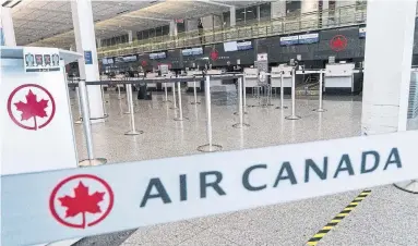  ?? PAUL CHIASSON THE CANADIAN PRESS FILE PHOTO ?? CUPE wants Ottawa to press Air Canada to top up the 75 per cent wage subsidy. Air Canada and Rouge employ about 10,000 flight attendants and service directors, of which only about 2,000 are working.