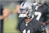  ?? JOHN LOCHER — THE ASSOCIATED PRESS ?? Las Vegas Raiders wide receiver Henry Ruggs III (11) attends practice on Aug. 13, in Henderson, Nev.