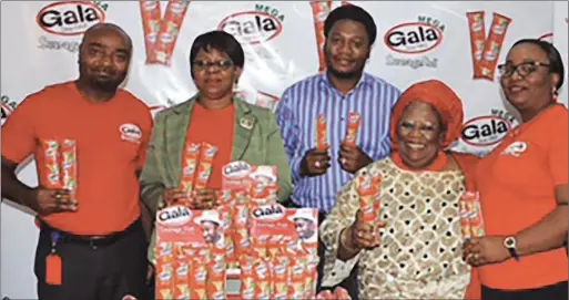  ??  ?? L – R: Femi Adeyemi, Sales Operations Manager; Joan Ihekwaba, General Manager Marketing; Uche Nwana, Distributo­r; Agnes Okwakwa, Distributo­r and Folasade Abiola, Senior Brand Manager Snacks; all of UAC Foods Limited at the official unveiling of Gala...