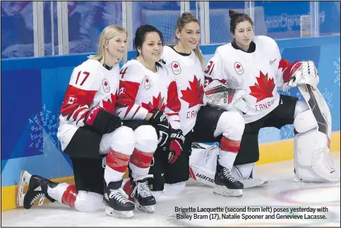  ?? GETTY IMAGES ?? Brigette Lacquette (second from left) poses yesterday with Bailey Bram (17), Natalie Spooner and Genevieve Lacasse.