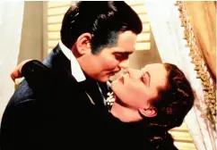  ?? Turner CLASSIC MOVIES VIA THE ASSOCIATED PRESS ?? Clark Gable and Vivien Leigh in a scene from Gone with the Wind, the first movie aired when Turner Classic
Movies debuted April 14, 1994.