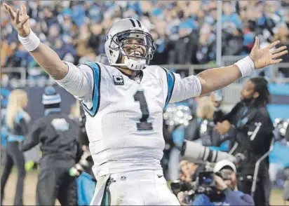  ?? AP PHOTO ?? Carolina Panthers’ Cam Newton celebrates a touchdown pass during the second half of the NFC Championsh­ip game against the Arizona Cardinals in Charlotte, N.C., on Sunday.